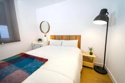 Cama o camas de una habitación en Exyca Cuatro Caminos