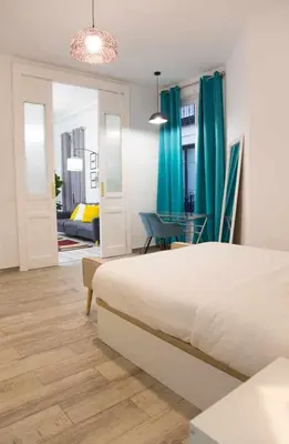 Cama o camas de una habitación en Una Lujosa estancia en las cortes Madrid