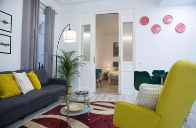 Zona de estar de Una Lujosa estancia en las cortes Madrid