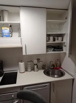 Una cocina o zona de cocina en Departamento de Lujo Atocha