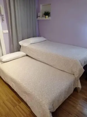 Cama o camas de una habitación en Departamento de Lujo Atocha