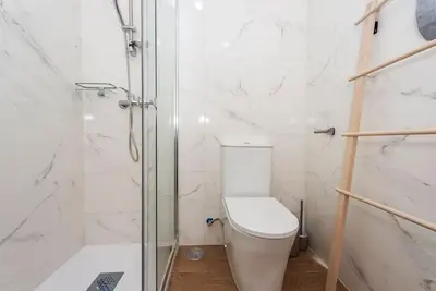 Un baño de Estudio en Barrio La Latina