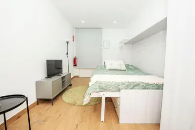 Cama o camas de una habitación en Estudio en Barrio La Latina