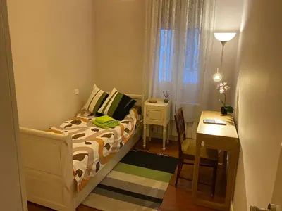 Cama o camas de una habitación en Home sharing La Justicia