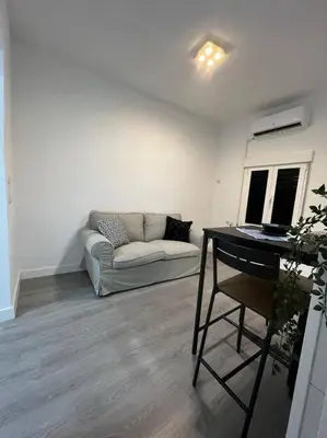 Una televisión o centro de entretenimiento en Apartamento céntrico en chueca