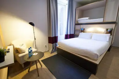 Cama o camas de una habitación en Toc Hostel Madrid