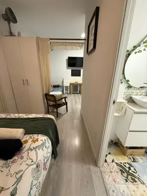 Una televisión o centro de entretenimiento en Malasaña Love