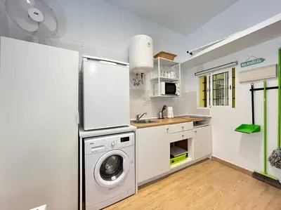 Una cocina o zona de cocina en Piso Palma Madrid Temporal