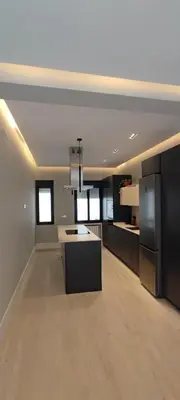 Una cocina o zona de cocina en En el corazón de Madrid, casa Moderna