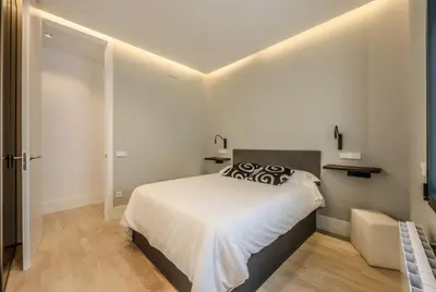 Cama o camas de una habitación en En el corazón de Madrid, casa Moderna