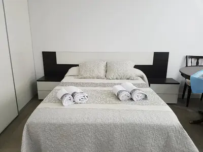 Cama o camas de una habitación en Turísticos Cuenca 3