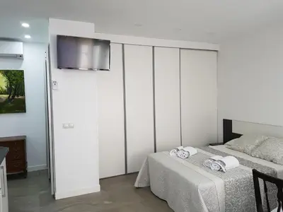 Cama o camas de una habitación en Turísticos Cuenca 3