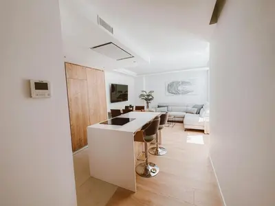 Una televisión o centro de entretenimiento en Chamberí Living - Nuevos Apartamentos de Lujo