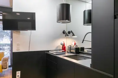 Una cocina o zona de cocina en HOMEABOUT MADRID RÍO APARTMENT