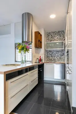 Una cocina o zona de cocina en HOMEABOUT MADRID RÍO APARTMENT