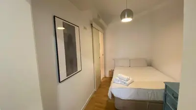 Cama o camas de una habitación en Comfortable flat in Paseo del Prado Atocha-ALMD8