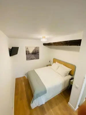 Cama o camas de una habitación en Spectacular apartment Atocha-SOLER