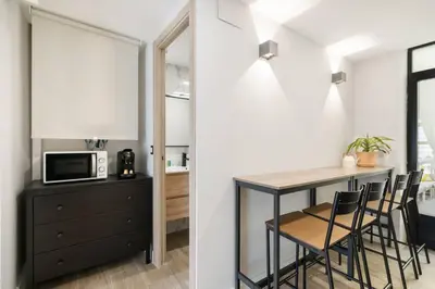 Una cocina o zona de cocina en Moderno loft en Ronda de Segovia-1
