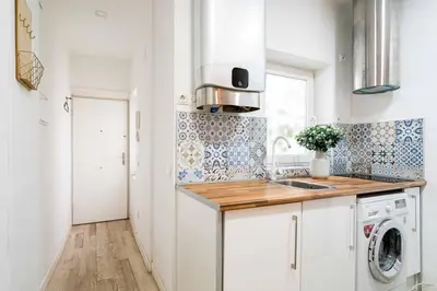 Una cocina o zona de cocina en Avenida America Apartment-DAG2
