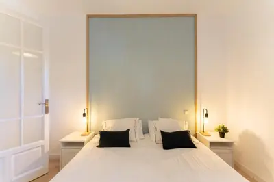 Cama o camas de una habitación en Luxe Apartment in Chamberí Chic