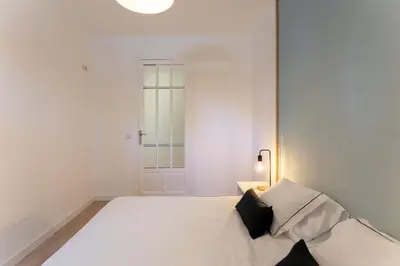 Cama o camas de una habitación en Luxe Apartment in Chamberí Chic