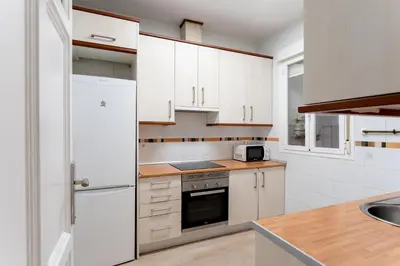 Una cocina o zona de cocina en Luxe Apartment in Chamberí Chic