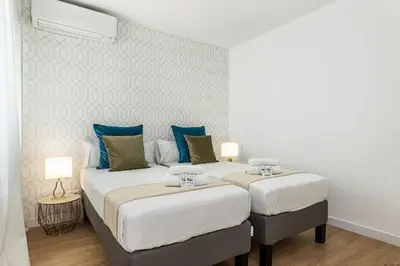 Cama o camas de una habitación en Nice apartment near Gran Vía VAL27