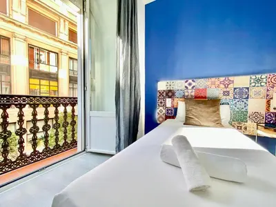 Cama o camas de una habitación en Puerta del Sol Center - 6 dormitorios en el Centro de Madrid