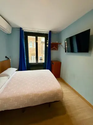 Cama o camas de una habitación en CH Casillas