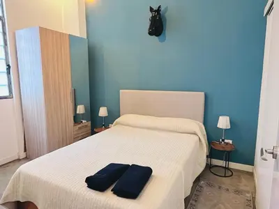 Cama o camas de una habitación en Moderno apartamento 2habitaciones Avda América