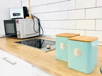 Una cocina o zona de cocina en Moderno apartamento 2habitaciones Avda América