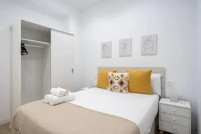 Cama o camas de una habitación en Apartamento acogedor y cómodo en Guindalera GUAD-D