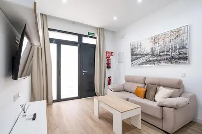 Una televisión o centro de entretenimiento en Apartamento acogedor y cómodo en Guindalera GUAD-D