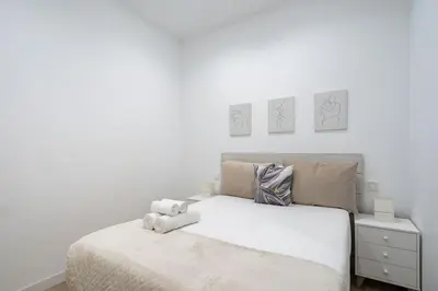 Cama o camas de una habitación en Apartamento acogedor y cómodo GUAD-C