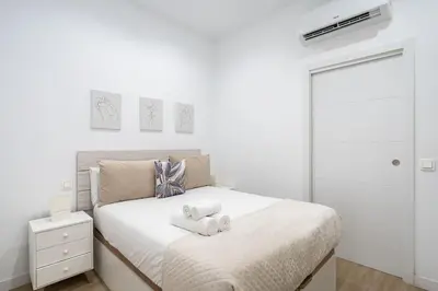 Cama o camas de una habitación en Apartamento acogedor y cómodo GUAD-C