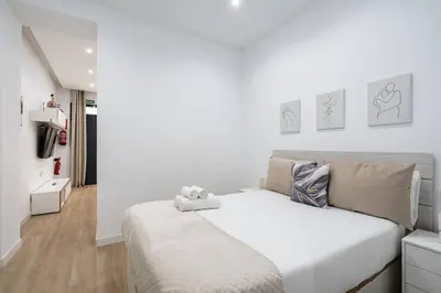 Cama o camas de una habitación en Apartamento acogedor y cómodo GUAD-C