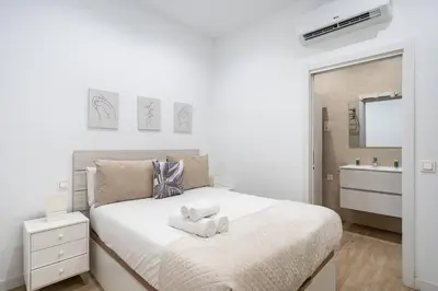 Cama o camas de una habitación en Apartamento acogedor y cómodo GUAD-C