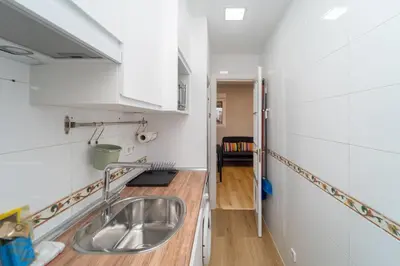 Una cocina o zona de cocina en GuestReady - Cozy nest in Madrid
