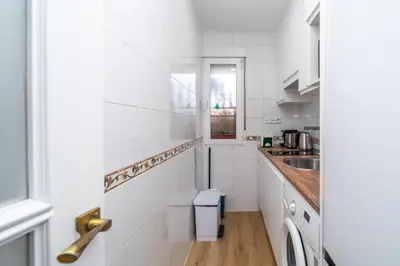 Una cocina o zona de cocina en GuestReady - Cozy nest in Madrid