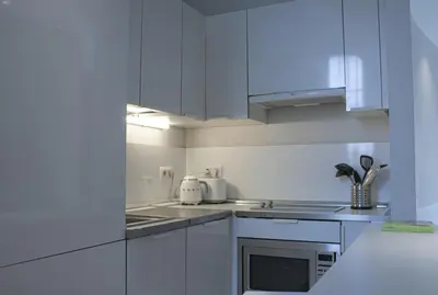 Una cocina o zona de cocina en Royal Palace Apartment by SharingCo