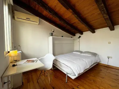 Cama o camas de una habitación en Latina