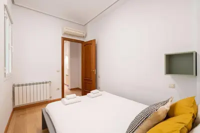 Cama o camas de una habitación en Flat in Barrio de las Letras / Cervantes20