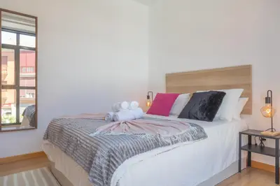 Cama o camas de una habitación en Luminoso Madrid Javalambre Temporal