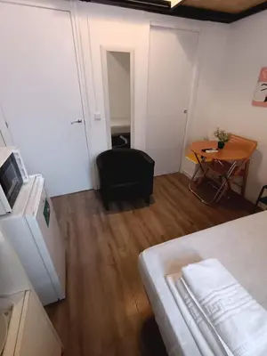 Cama o camas de una habitación en Alanta Apartments