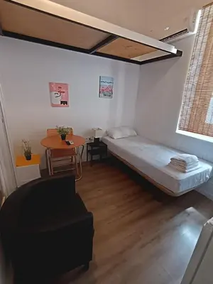 Cama o camas de una habitación en Alanta Apartments