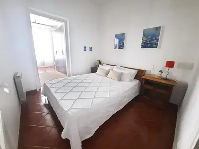 Cama o camas de una habitación en BARRIO DE LAS LETRAS, Corazón de Madrid