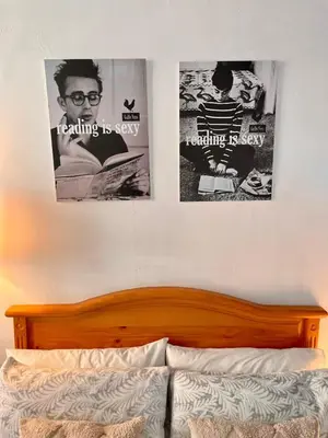 Cama o camas de una habitación en BARRIO DE LAS LETRAS, Corazón de Madrid