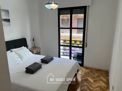 Cama o camas de una habitación en MyHouseSpain - Maravilloso apartamento renovado