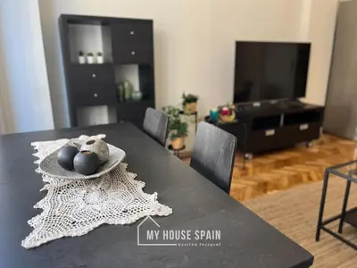 Una televisión o centro de entretenimiento en MyHouseSpain - Maravilloso apartamento renovado