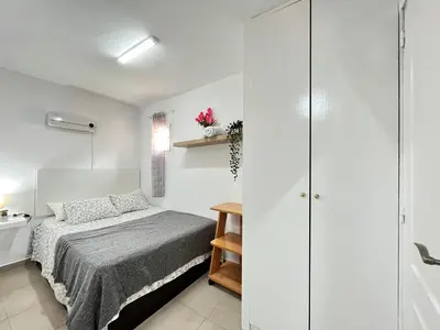 Cama o camas de una habitación en Estudio Acogedor Amparo Temporal